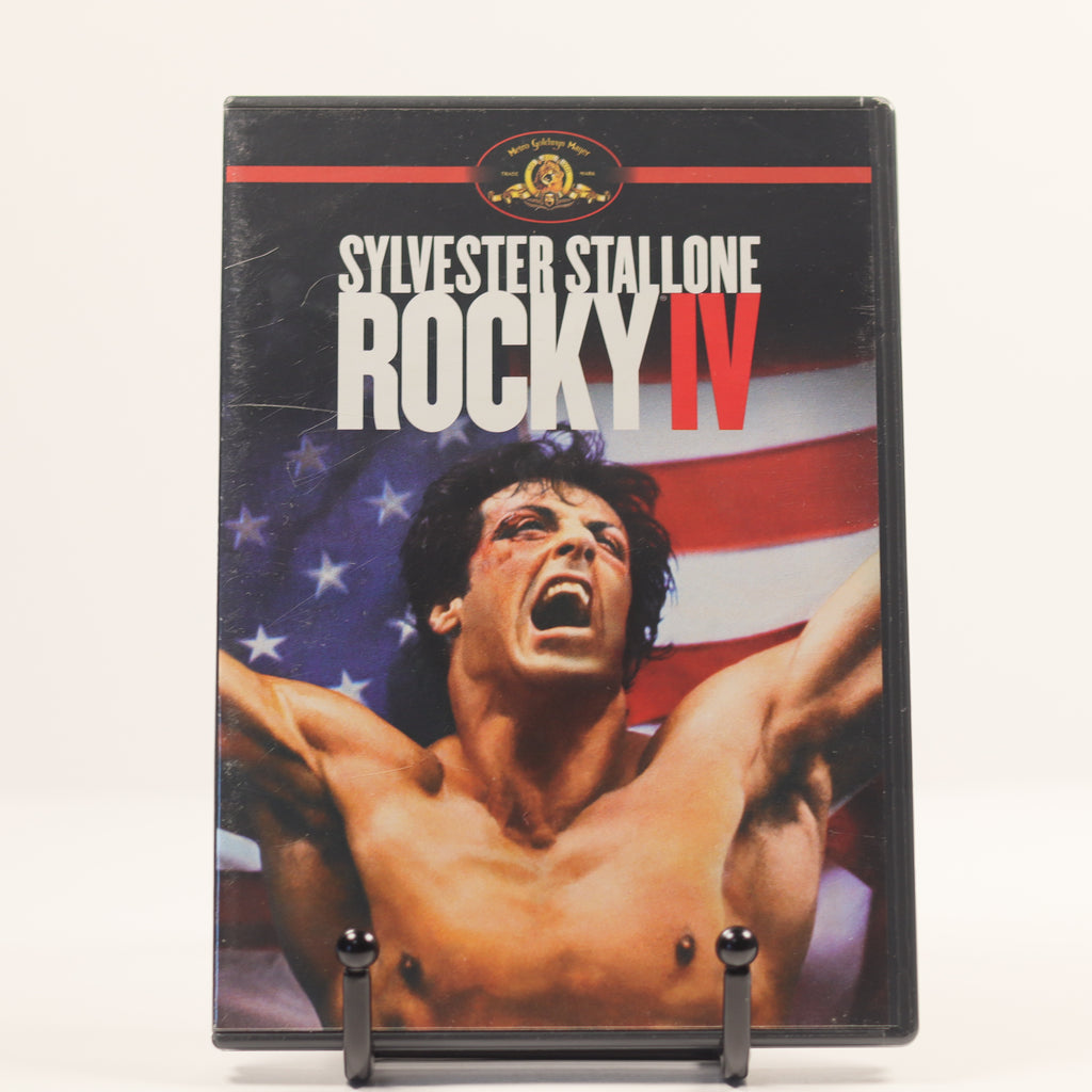DVD cover of 'Rocky IV' featuring Sylvester Stallone with an American flag in the background