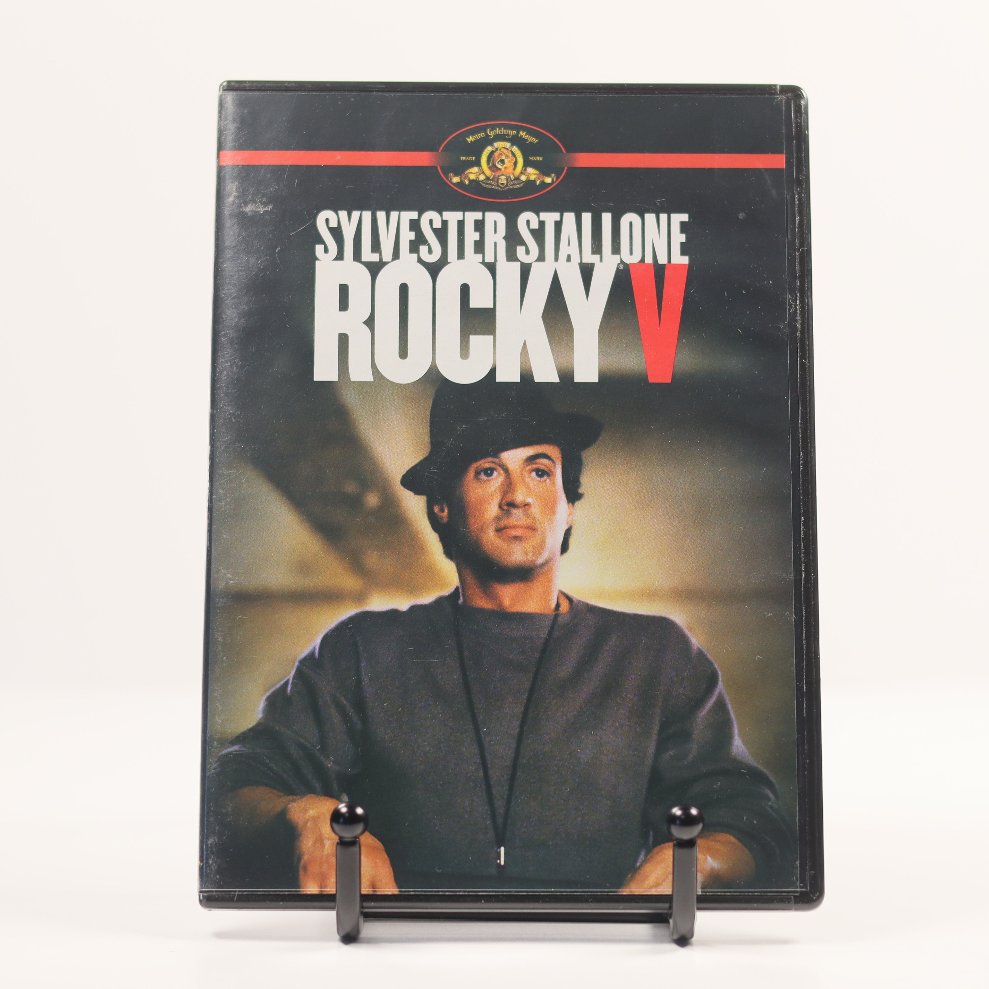 DVD cover of 'Rocky V' featuring Sylvester Stallone on a white background
